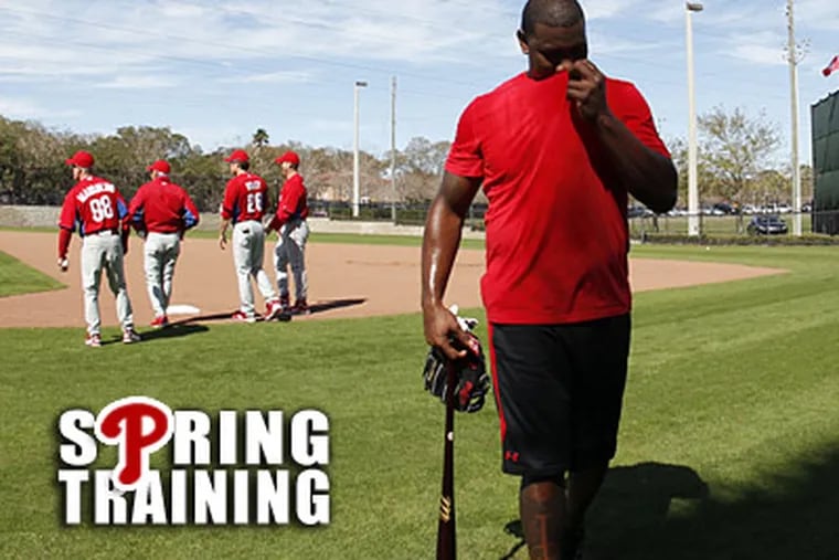 Ryan Howard is back in camp and wearing a boot. (Yong Kim/Staff Photographer)