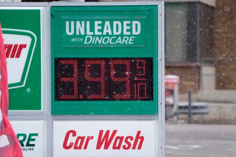 Price for a gallon of regular-grade gasoline is shown on a digital sign at a service station Wednesday in Denver.