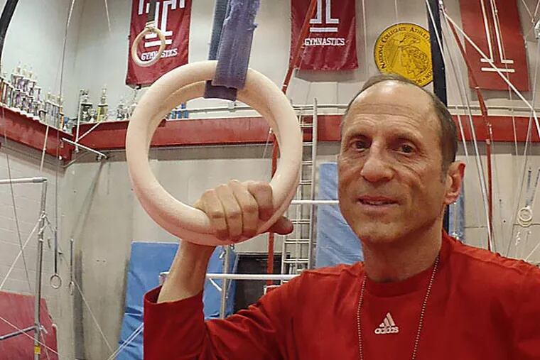 Photo of Fred Turoff, who has coached Temple men's gymnastics for 38 years and is fighting to keep his program alive. (Photo by Bob Ford)