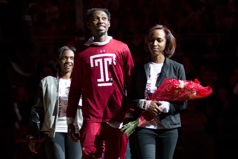 Shizz Alston is joined by his family during Senior Day celebrations ahead of Temple's win against UCF.