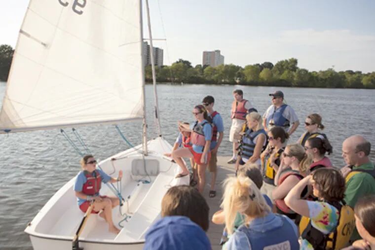 At the Cooper River Yacht Club in Collingswood, Allison Oberg goes over the basics for those just learning to sail. ED HILLE / Staff Photographer