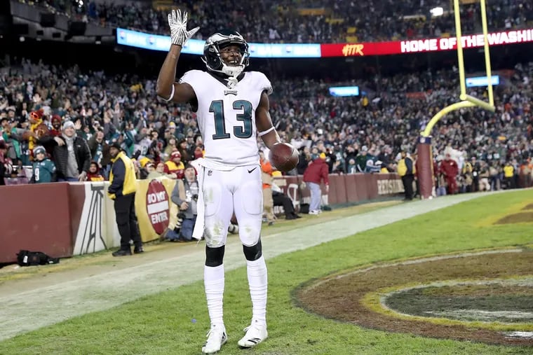 Eagles wide receiver Nelson Agholor waves to the crowd after scoring in the 4th quarter against Washington. The Philadelphia Eagles win 24-0 over the Washington Redskins at FedExField in Landover, MD on December 30, 2018.