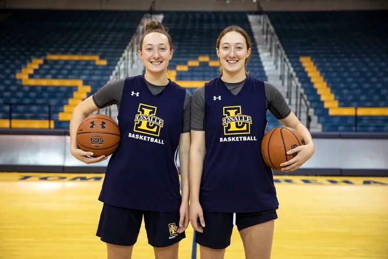Identical twins from Australia, Amy Jacobs (left) and Claire Jacobs are fourth and first, respectively, in scoring for the Explorers.