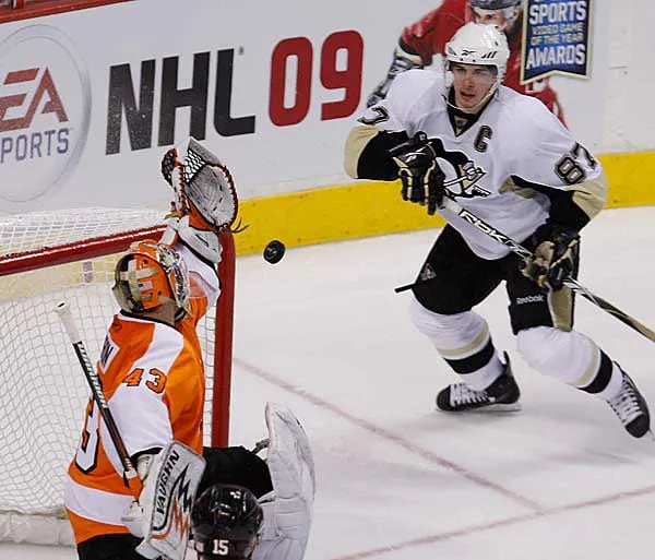 Philadelphia Flyers goalie Martin Biron turns away a shot on-goal