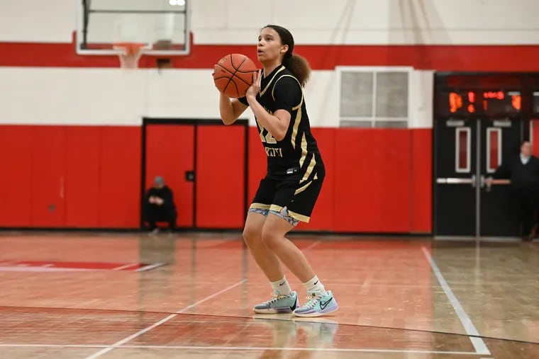 Neumann Goretti freshman Reginna Baker goes for a shot against Archbishop Carroll this past season. Baker is playing for the Philly Belles 16U team this summer.