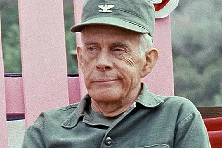 In this Sept. 19, 1982 photo, Actor Harry Morgan sits on the set of  "M*A*S*H*" in Los Angeles.