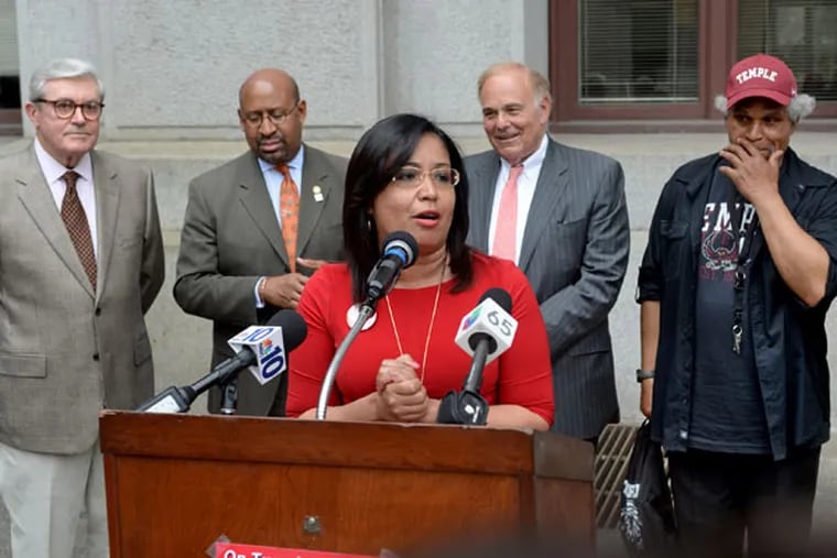 Councilwoman Maria Quiñones Sánchez is backed by four mayors outside City Hall during a press conference May 5, 2015. Mayors, from left, are Bill Green, Michael Nutter, Ed Rendell and John Street. (TOM GRALISH/Staff Photographer)