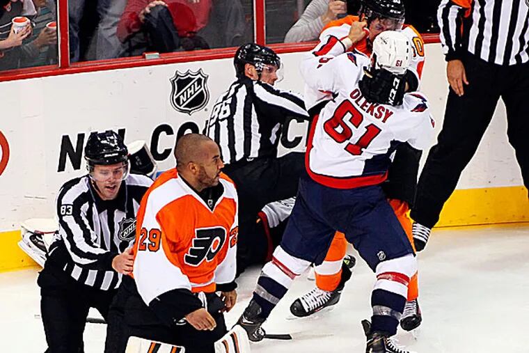 Nov. 3, 2013 - Philadelphia, Pennsylvania, U.S - November 1, 2013: Philadelphia  Flyers goalie Ray Emery (29) fights with Washington Capitals goalie Braden  Holtby (70) during the NHL game between the Washington