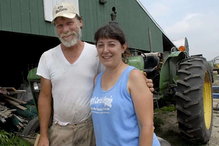 Owners Bob and Leda Muth at their community-supported-agriculture operation in Williamstown. “This year, we have more demand than ever,” says Leda Muth. “People want their produce fresh.” (April Saul / Staff Photographer)