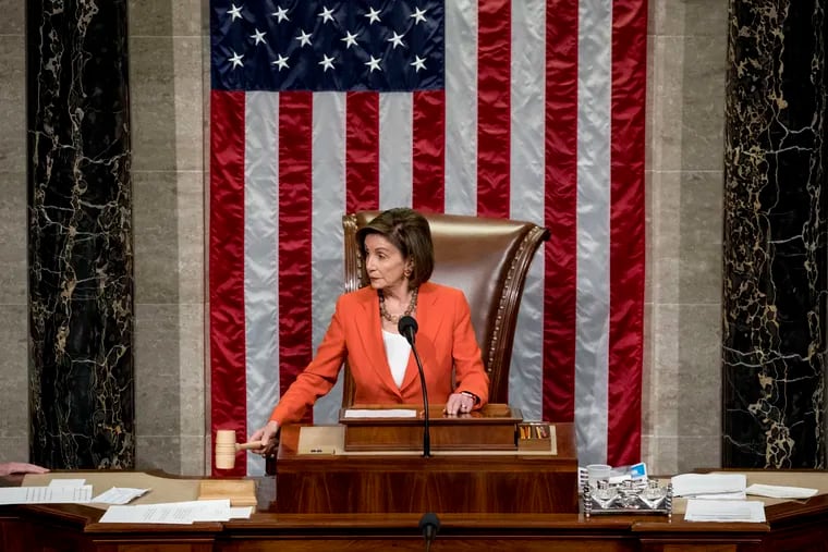 Nancy Pelosi wielding the speaker's gavel in the House of Representatives.