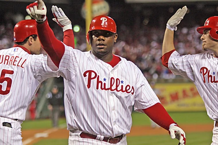 Ryan Howard's two home runs helped bring the Phillies within one win of Philadelphia's first major sports championship in 25 years. (Yong Kim/Staff Photographer)