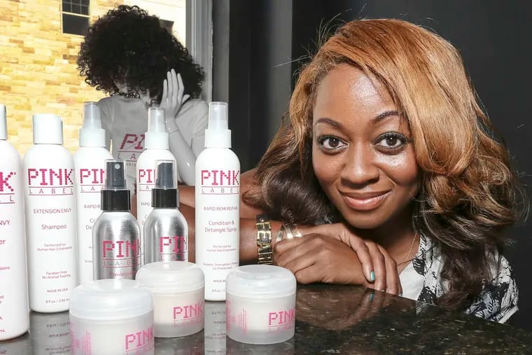 TALKING SMALL BIZ with Yolanda Keels-Walker, the owner of Suite Extensions, a women's hair salon in Germantown and a line of beauty products for men and women called Pink Label Beauty. Thursday, August 28, 2013.  (  Steven M. Falk / Staff Photographer )