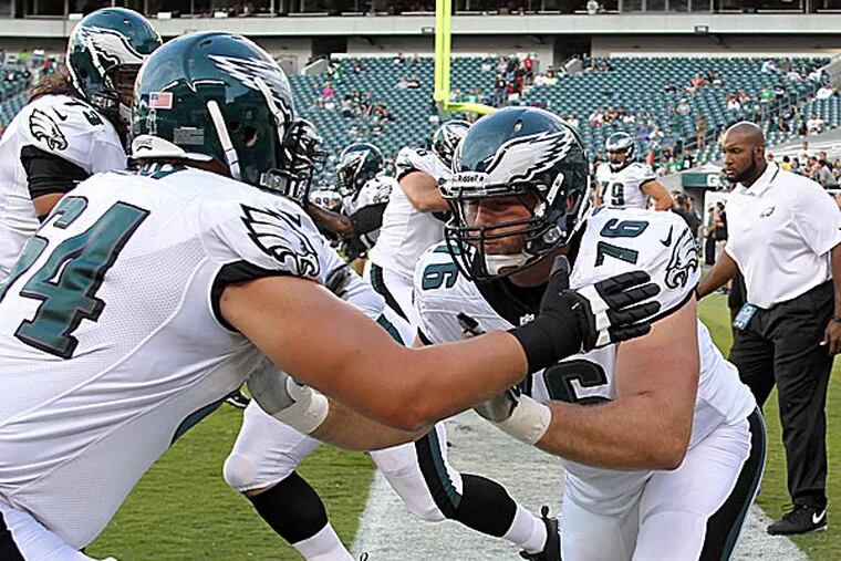 Eagles offensive linemen Allen Barbre and Clifton Geathers. (Yong Kim/Staff Photographer)