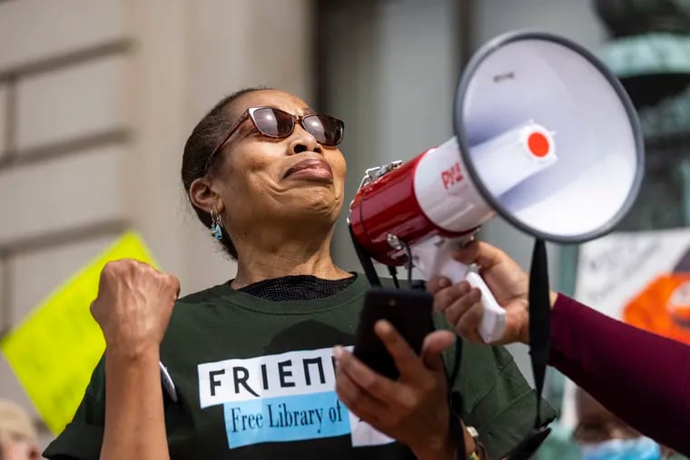 Yvette Hill-Robinson, Friend of Overbrook Park Library and Friend at Large, speaks in front of fellow members of Friends of the Free Library of Philadelphia and press demanding that the city council restore and increase Free Library funding on Wednesday, June 2, 2021.