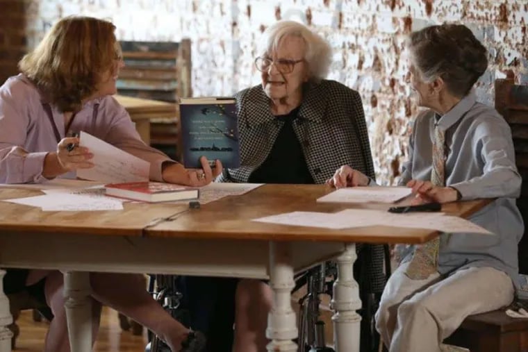 Author Harper Lee (center) with filmmaker Mary McDonagh Murphy (left) and Lee's friend Joy Brown in Monroeville, Ala., last month. After months of anticipation, Lee's novel, aswirl in controversy, comes out this week.