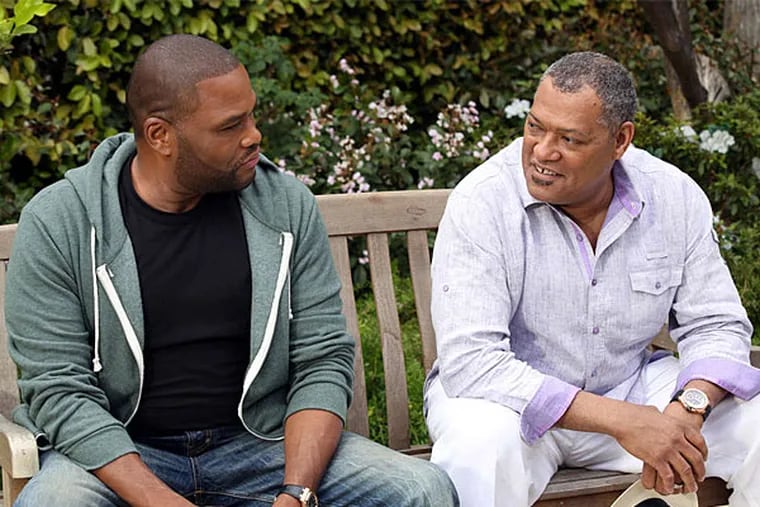 Anthony Anderson (left), Laurence Fishburne as son and father in the comedy &quot;Black-ish,&quot; about parents worried about too much suburban assimilation. (ABC)