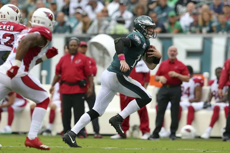 Eagles quarterback Carson Wentz (11) in action against the Cardinals on Sunday.