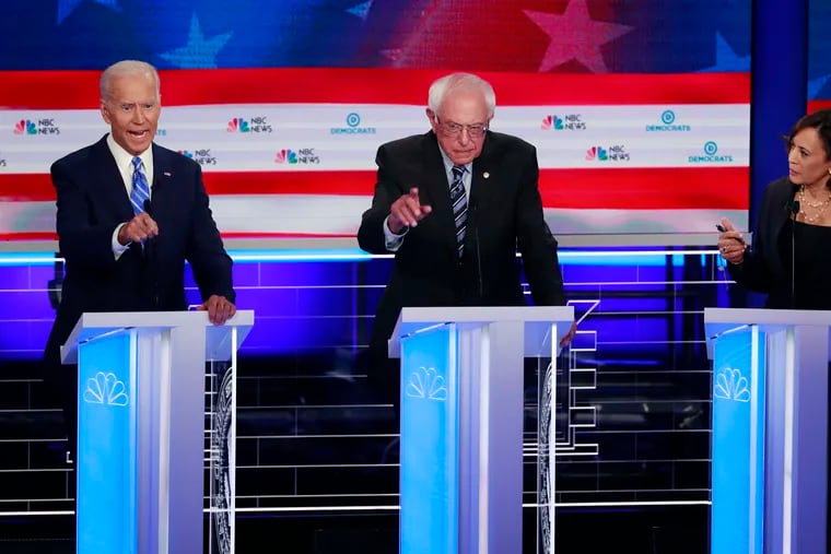 Former Vice President Joe Biden (left) and Sens. Bernie Sanders of Vermont and Kamala Harris of California during Thursday night’s debate in Miami.