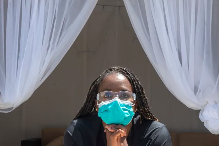 Tahita Ross, dental hygienist, is photographed at her home in Newark, Delaware. Wednesday, may 27, 2020. Dental hygienists being concerned about going back to work. Tahita is born and raised in Philly but practices in both PA and Delaware.