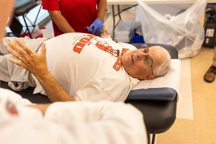 Marc Satalof, 76, of Upper Gwynedd donates his 280th pint of blood at Penn's Perelman Center for Advanced Medicine, his final donation to the Red Cross after more than 50 years.