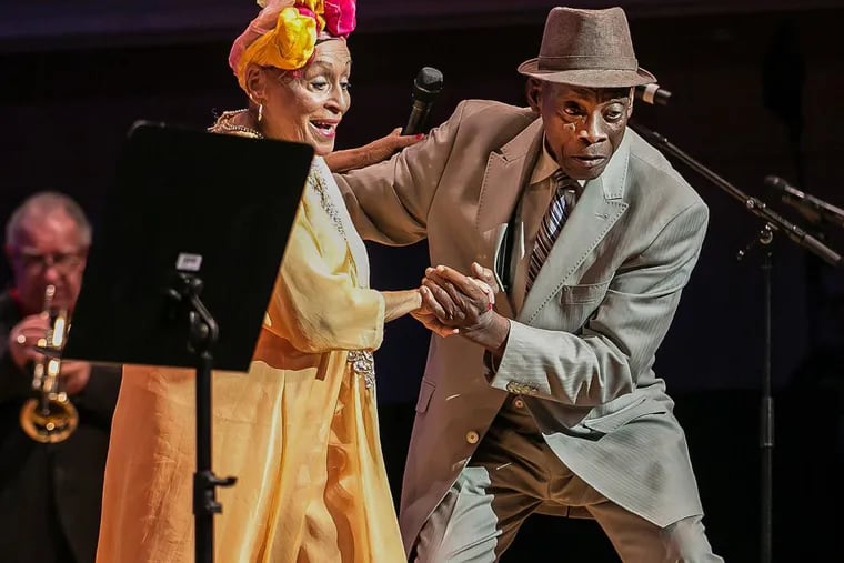 “BUENA VISTA SOCIAL CLUB: ADIO”: (l to r) Omara Portuondo (vocals) and Papi Oviedo (Tres player) perform in the documentary. (Credit: Dragan Tasic / Broad Green Pictures)