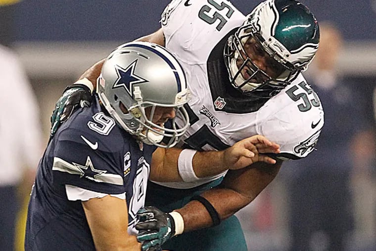 Eagles linebacker Brandon Graham hits Cowboys quarterback Tony Romo. (Ron Cortes/Staff Photographer)
