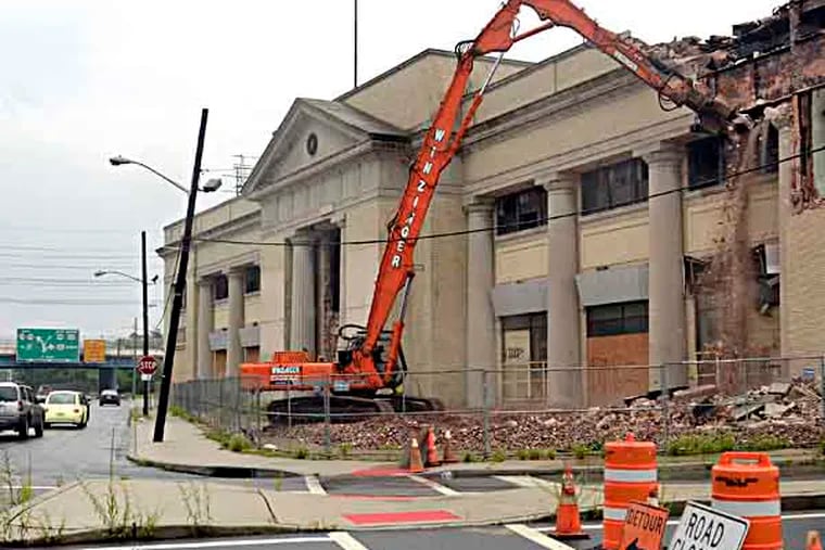 Demolition began in 2013 on the 1927 former Sears building in Camden. ( TOM GRALISH / Staff Photographer )