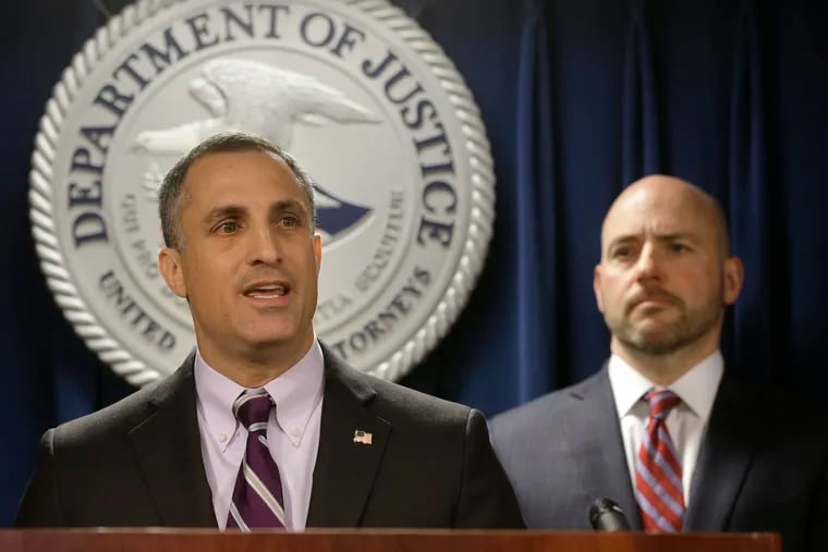 FBI Special Agent in Charge Boston Division Joseph Bonavolonta, left, and U.S. Attorney for District of Massachusetts Andrew Lelling, right, face reporters as they announce indictments in a sweeping college admissions bribery scandal during a news conference, Tuesday, March 12, 2019, in Boston.