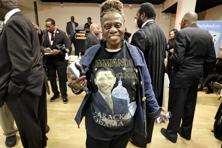 Minnetta Metz of Philadelphia wore an Obama T-shirt and jacket to the Obama Out Party at the African American Museum on Jan. 20, 2017.