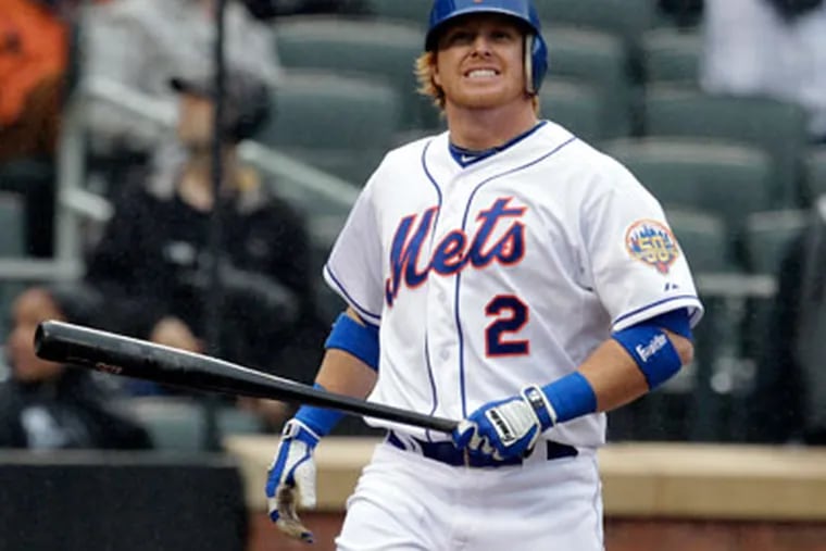 New York Mets' Justin Turner reacts during his last at-bat in the
ninth inning of a baseball game against the Miami Marlins, Thursday,
April 26, 2012, at Citi Field in New York. Turner was walked after
thirteen pitches and the Mets won 3-2. (AP Photo/Seth Wenig)