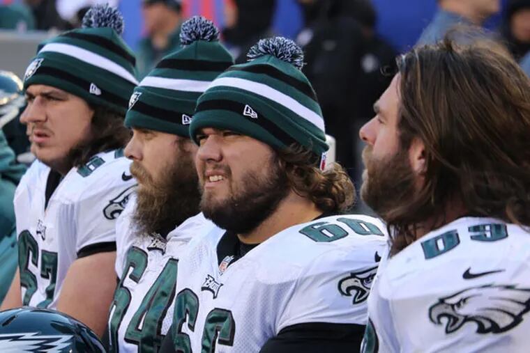 (From left to right) Dennis Kelly, Jake Scott, Dallas Reynolds and Evan Mathis during the first half of an NFL football game Sunday, Dec. 30, 2012 in East Rutherford, N.J. (Peter Morgan/AP file)
