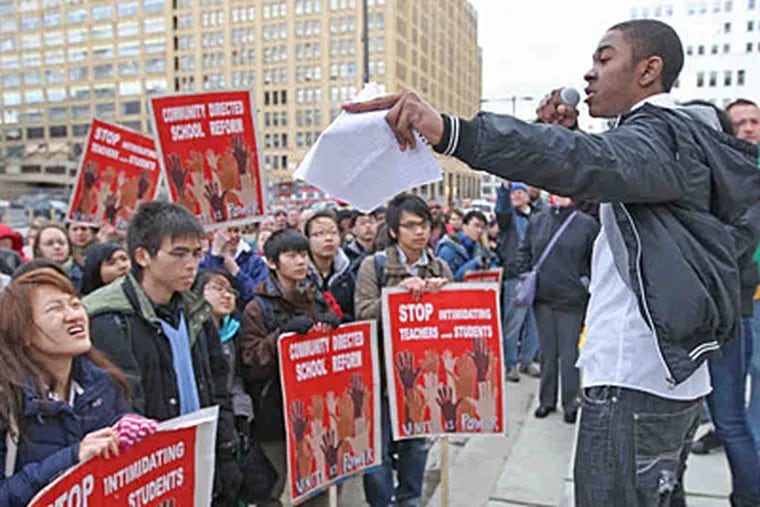 Maurice Johnson, a junior at Audenried High, addresses a gathering last month of more than 500 students, teachers, and parents protesting about changes coming to the school. (Kristen Graham/File photo)