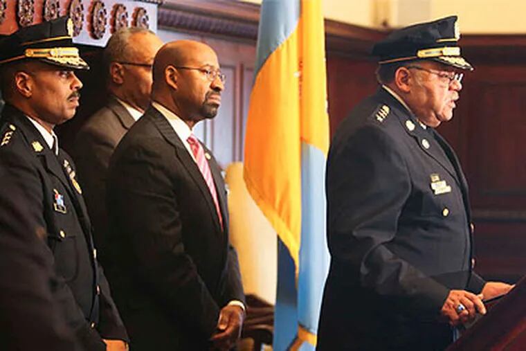 Police Commissioner Charles H. Ramsey, with Mayor Nutter behind him, at a City Hall news conference. Many of the 36 command changes announced involve the department's highest-ranking officers. (Ryan S. Greenberg  / Staff Photographer)