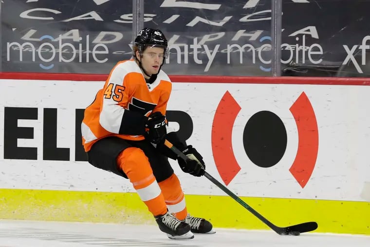 Flyers defenseman Cam York skating with the puck against the New Jersey Devils in the final game of the season on May 10.