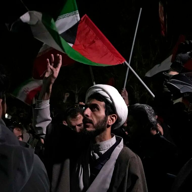 A cleric chants slogans during an anti-Israeli gathering in front of the British Embassy in Tehran, Iran, on Sunday, April 14, 2024. Iran launched its first direct military attack against Israel on Saturday.