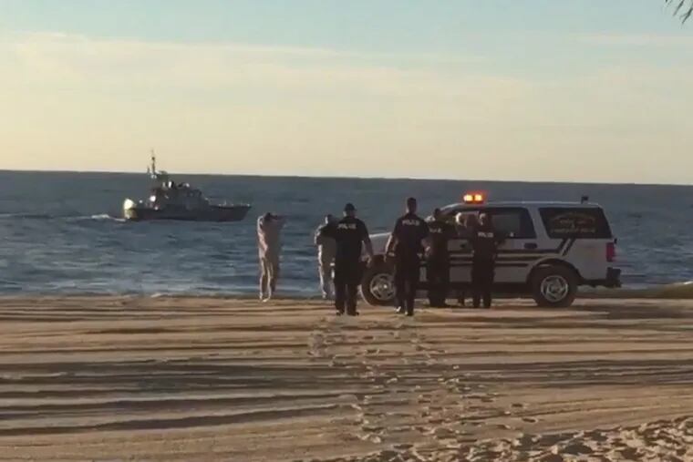 Rescuers search for a missing swimmer off Atlantic City who was later found dead.