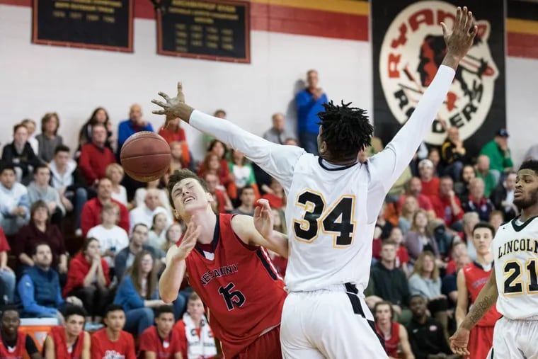 Lincoln’s Aseem Lucky knocks the ball out of Neshaminy’s Chris Arcidiacono’s hands during their win on Saturday.