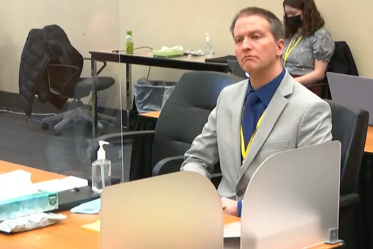 In this image from video, former Minneapolis police officer Derek Chauvin listens as his defense attorney Eric Nelson gives his closing argument.