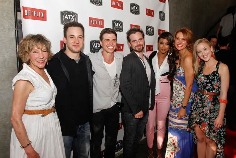 The cast of the the 1990s ABC sitcom "Boy Meets World," including Betsy Randle, Ben Savage, Matthew Lawrence, Rider Strong, Trina McGee, Maitland Ward, and Lily Nicksay, left to right, attend the ATX Television Festival opening night red carpet on Thursday, June 6, 2013, in Austin, Texas. (Jack Plunkett/Invision/AP)