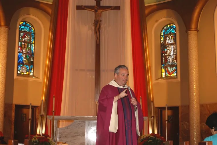 Msgr. Nelson J. Pérez says Mass in Spanish at the Church of St. William in Northeast Philadelphia in 2003. Pope Francis recently appointed Pérez as archbishop of the Archdiocese of Philadelphia.