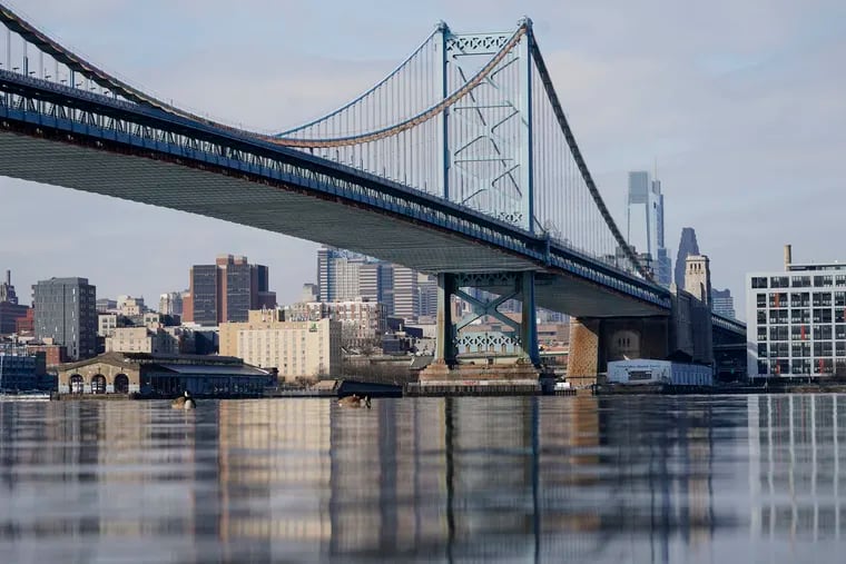 FILE - This Feb. 10, 2021 file photo shows the Philadelphia side of the Benjamin Franklin Bridge spanning the Delaware River.