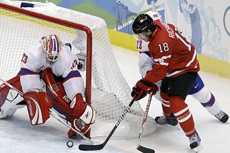 Mike Richards scores a goal in Canada's win over Norway at the Vancouver 2010 Olympics on Tuesday. (AP Photo/Julie Jacobson)