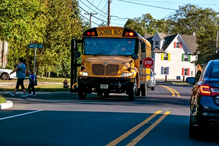 A school bus drops students off in Sewell, N.J. on Oct. 20, 2021. A handful of New Jersey school districts are returning to virtual learning this week while most Pa. schools in the Philadelphia suburbs will bring back students for in-person instruction.