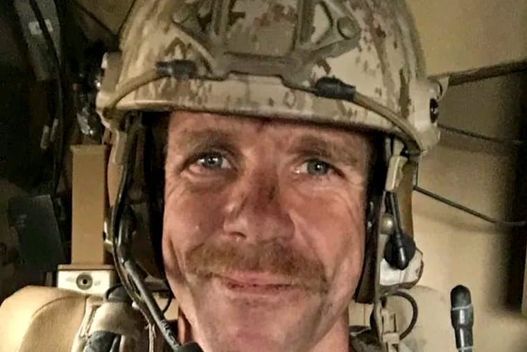 This undated selfie provided by Andrea Gallagher shows her husband, U.S. Navy SEAL Edward Gallagher, who has been charged with killing an Islamic State prisoner in his care and attempted murder for the shootings of two Iraq civilians in 2017. (Edward Gallagher/Courtesy of Andrea Gallagher via AP, File)