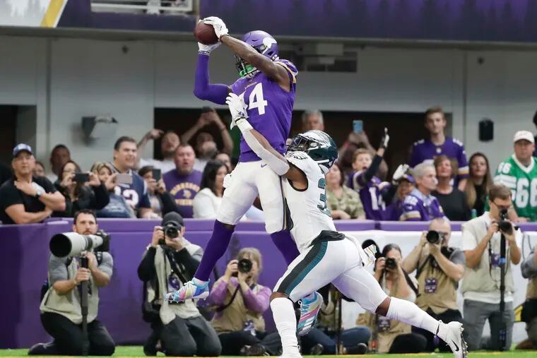 Minnesota Vikings wide receiver Stefon Diggs catches a third-quarter touchdown against Eagles defensive back Craig James on Sunday, October 13, 2019 in Minneapolis.