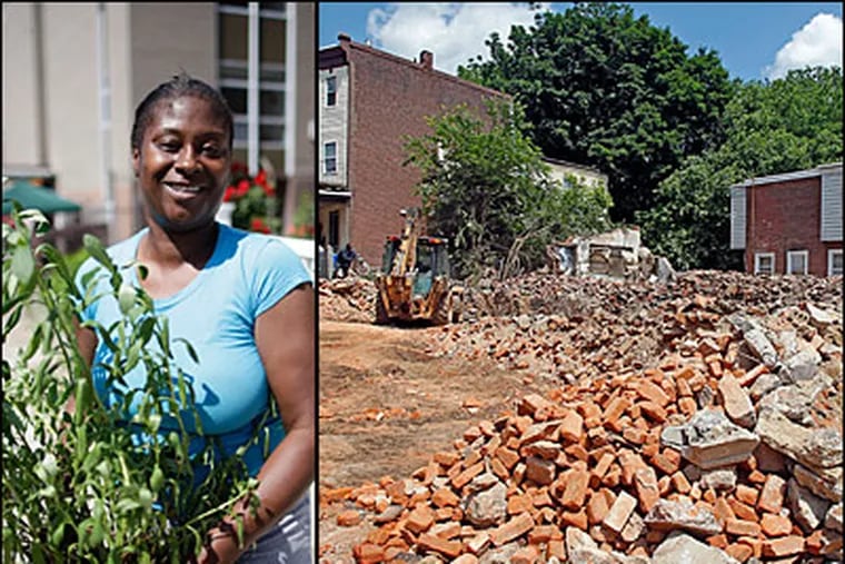 The city on Monday demolished a pair of abandoned homes in Germantown. At left, Kim Leonard, 43, with a Montauk daisy she planned to plant as part of a recent blockwide planting day. (David Swanson / Akira Suwa / Staff)
