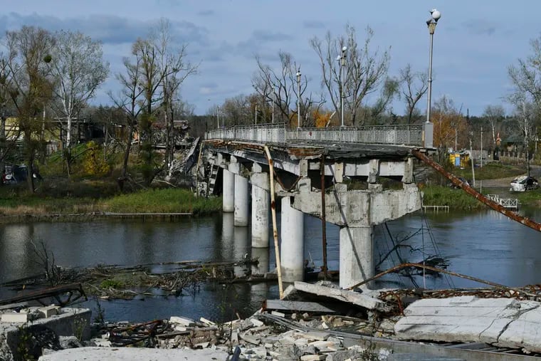 A view of a destroyed bridge across the Siverskyi-Donets river in the liberated town of Sviatohirsk, Donetsk region, Ukraine, Saturday, Oct. 29, 2022.