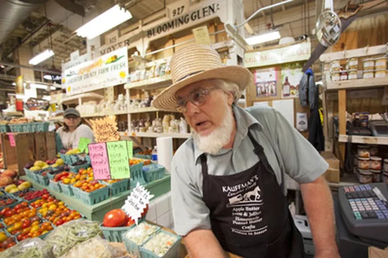 Benuel Kauffman has been selling his vegetables, fruits, and homemade jams and jellies at the market since 1979. (David M. Warren / Staff Photographer)