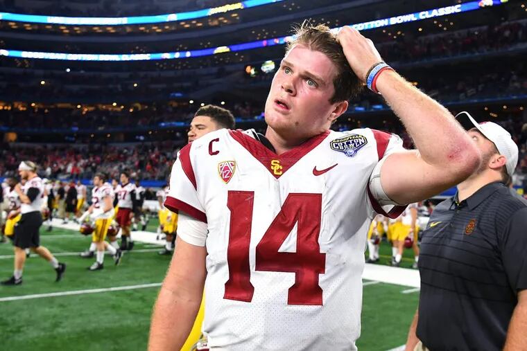 USC quarterback Sam Darnold (14) walks off the field after a 24-7 loss against Ohio State in the Cotton Bowl at AT&amp;T Stadium in Arlington, Texas, on December 29, 2017. (Wally Skalij/Los Angeles Times/TNS)
