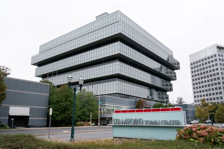 Purdue Pharma headquarters in Stamford, Conn., in October 2020. New Jersey and Pennsylvania announced settlement terms Thursday with the company that would resolve opioid lawsuits.  (AP Photo/Mark Lennihan, File)
